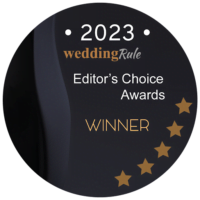 wedding rule 2023 200×200 A circular badge reading "2023 wedding Rule Editor's Choice Awards WINNER" with five gold stars on a black background.